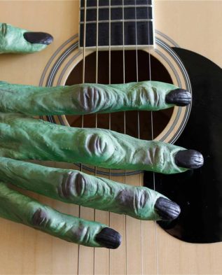 Rogue Pumpkin Witche' Hand on Guitar